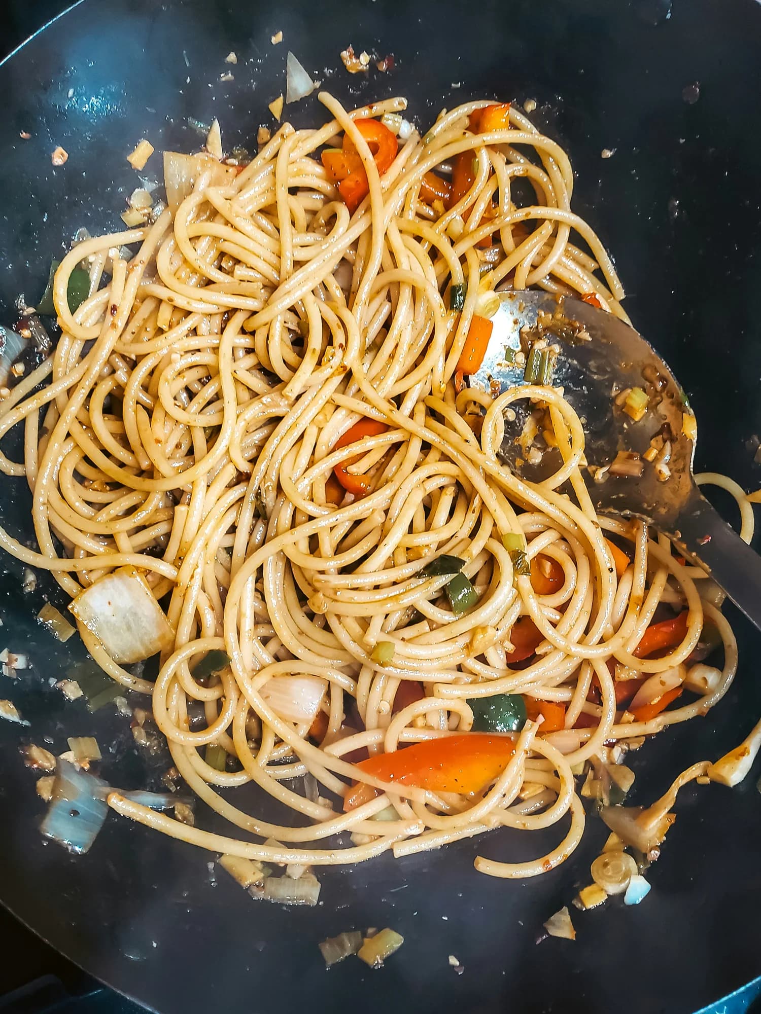 Noodles and vegetables cooking in a wok — representative photo, not taken at Chopstix — St. Enoch
