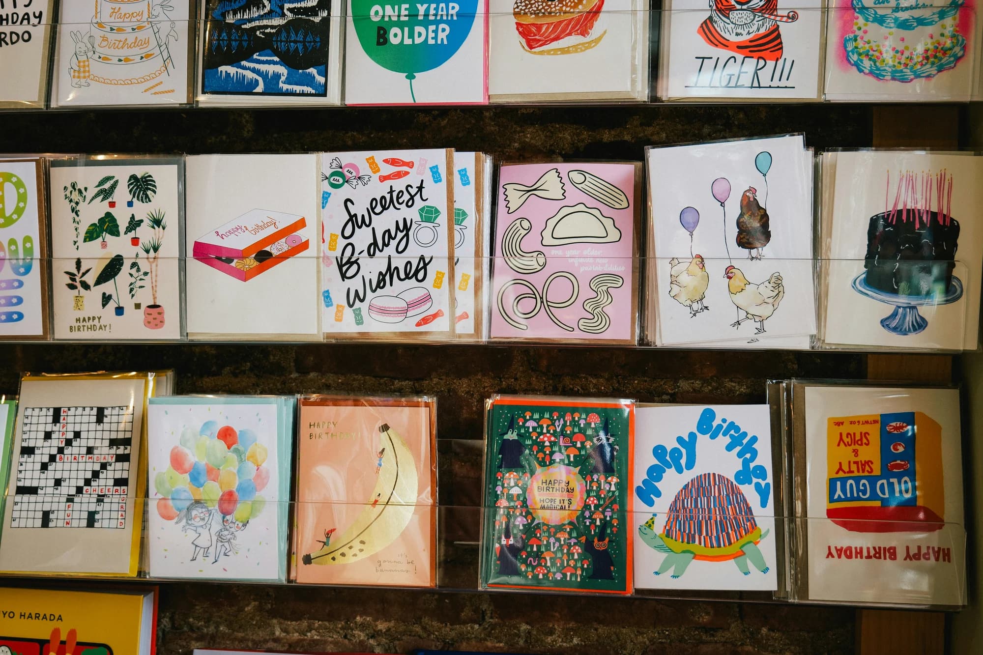 Greeting cards are displayed on shelves. — representative photo, not taken at Clintons — Buchanan Galleries