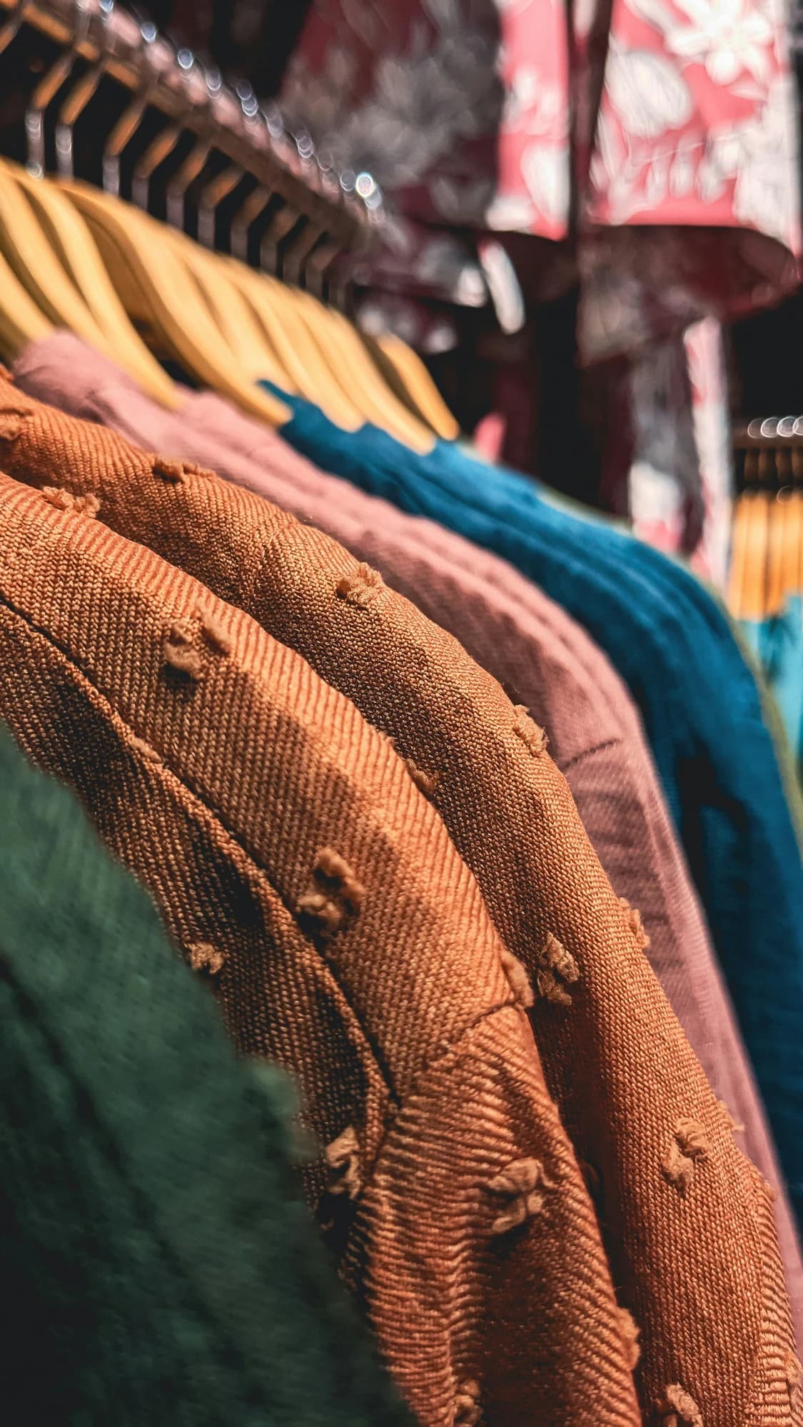 A row of clothes hanging on a rack in a store — representative photo, not taken at Colors — St. Enoch