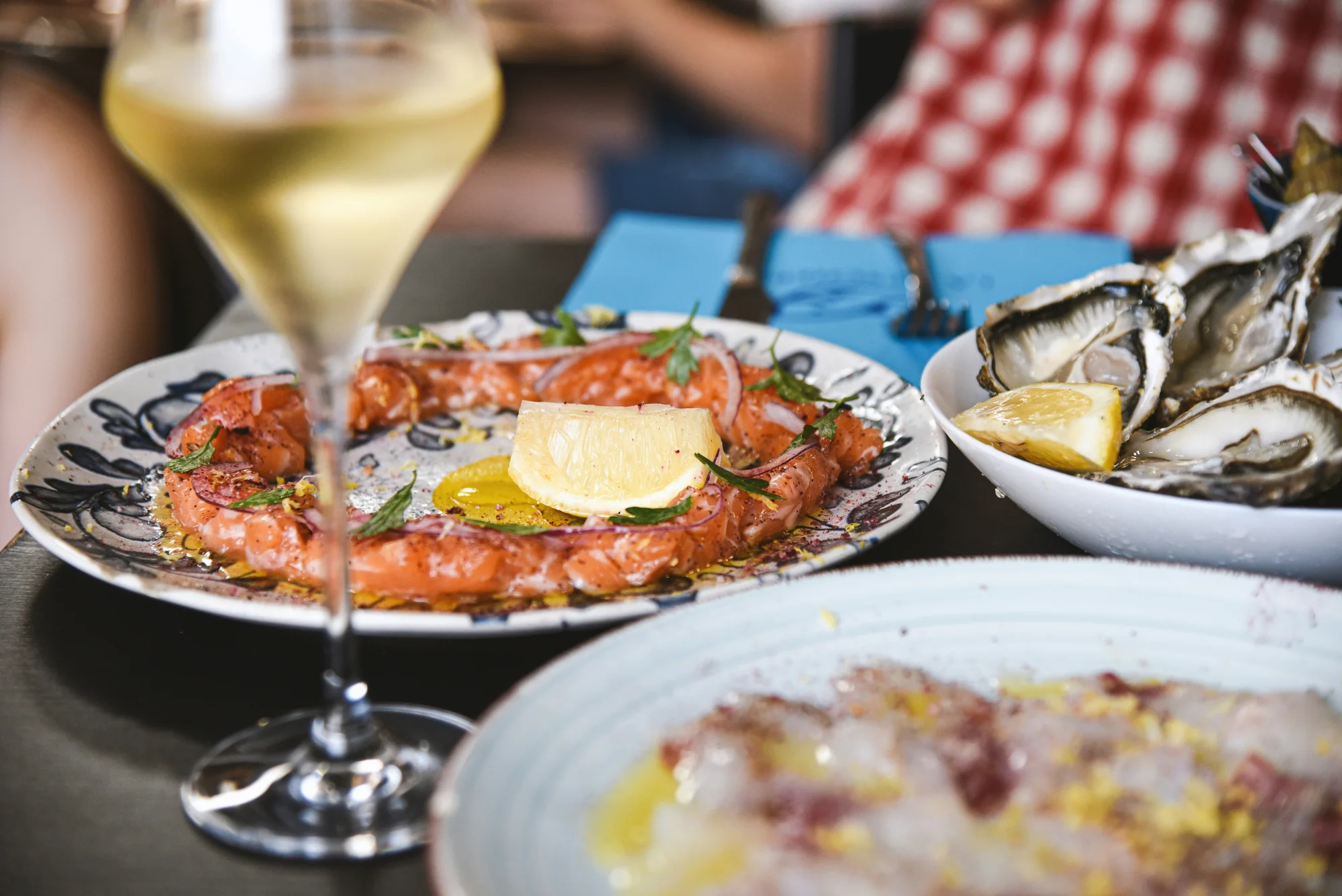Seafood dishes and champagne — representative photo, not taken at Crabshakk — Finnieston