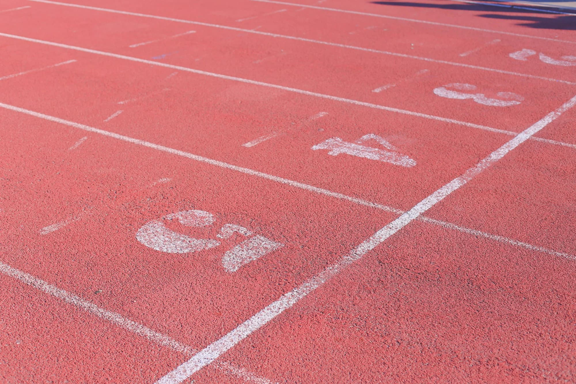 Running track lanes numbered five and four — representative photo, not taken at Glasgow Club Crownpoint