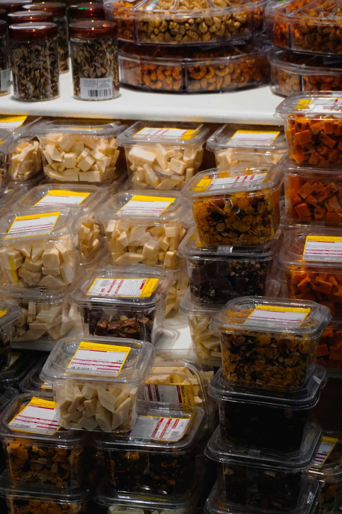 Various dried fruits and nuts in plastic containers. — representative photo, not taken at Grape Tree — St. Enoch