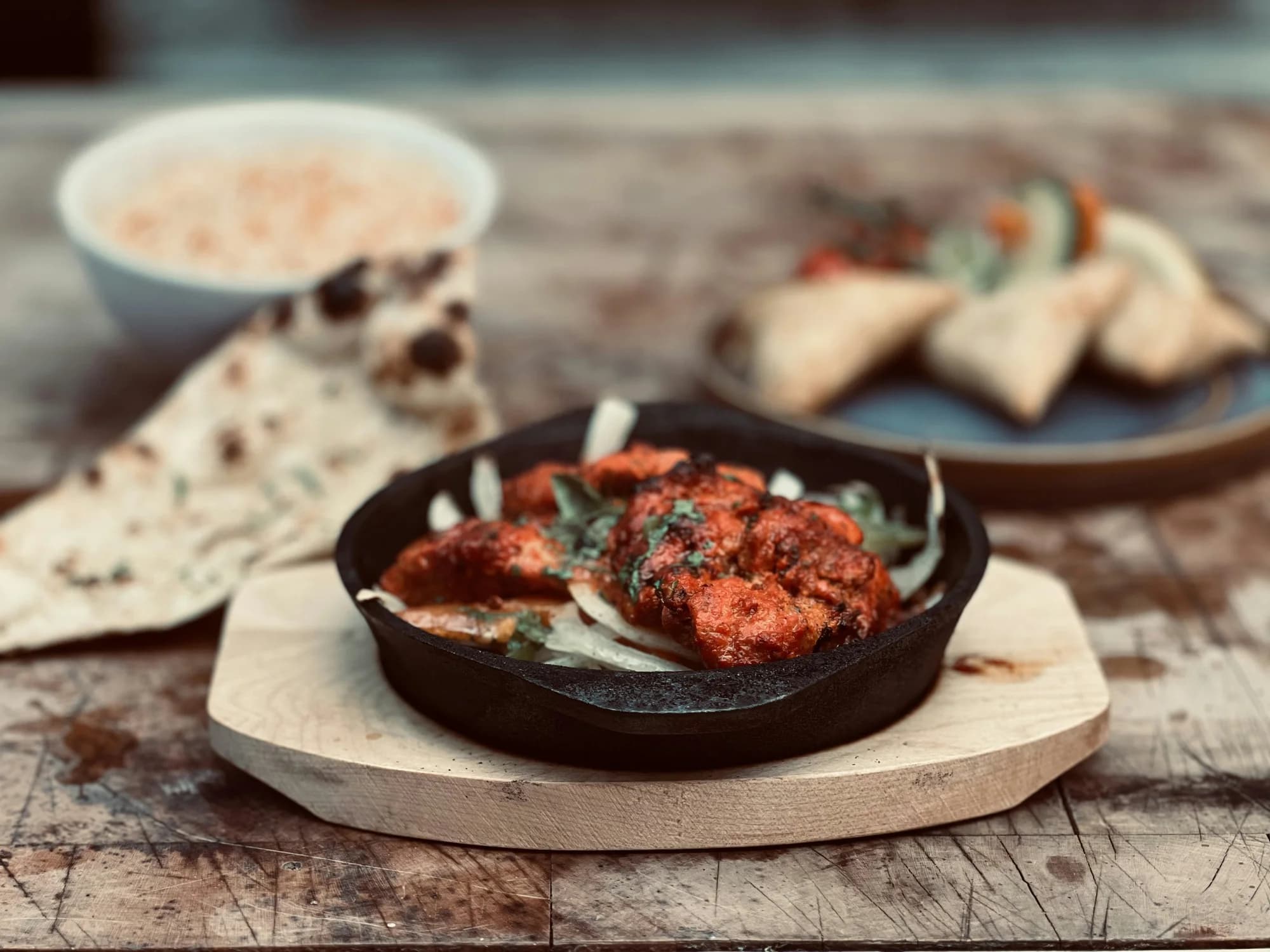 Naan, samosas and rice — representative photo, not taken at Mowgli Glasgow