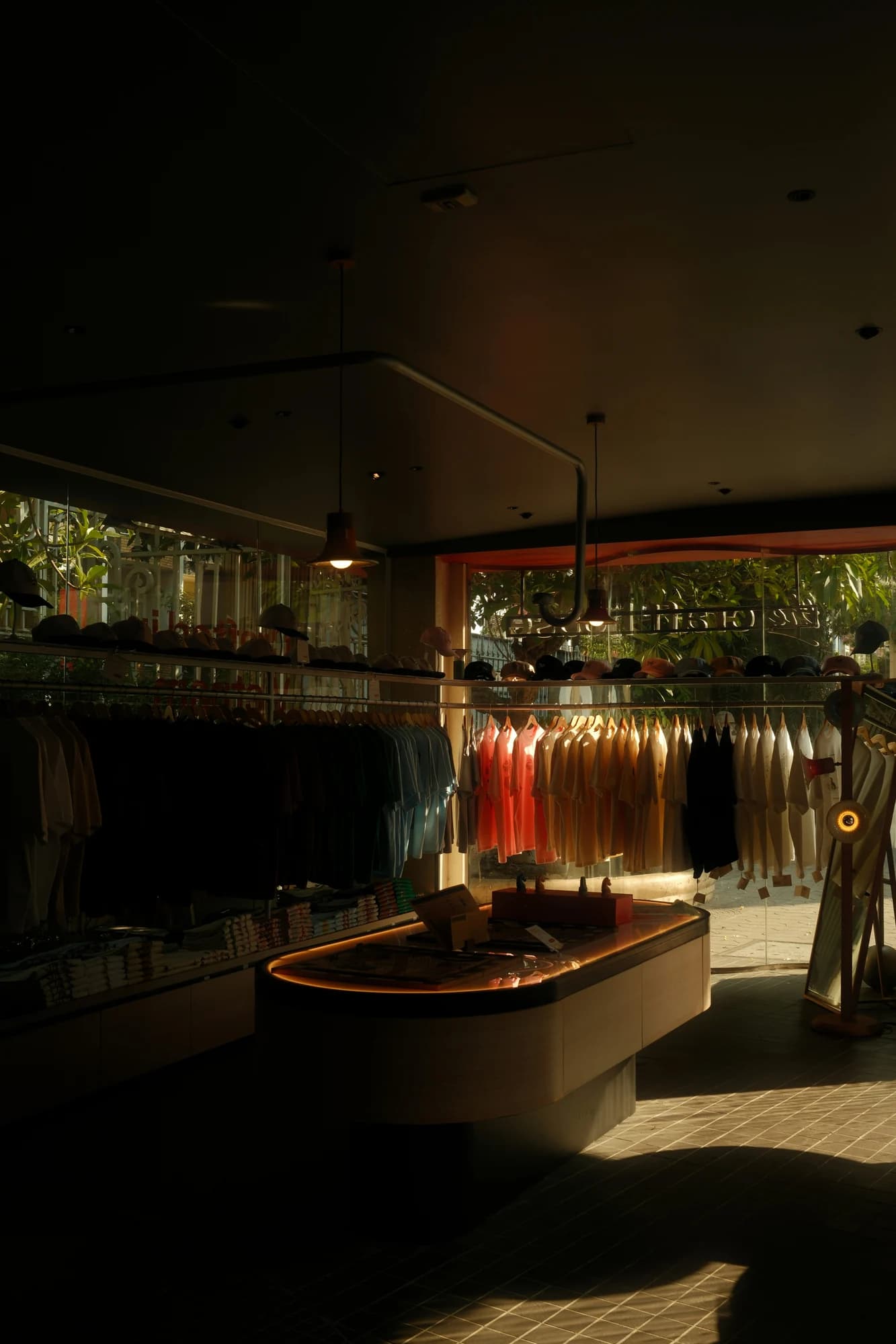 Clothing store interior with racks of apparel. — representative photo, not taken at Next — St. Enoch