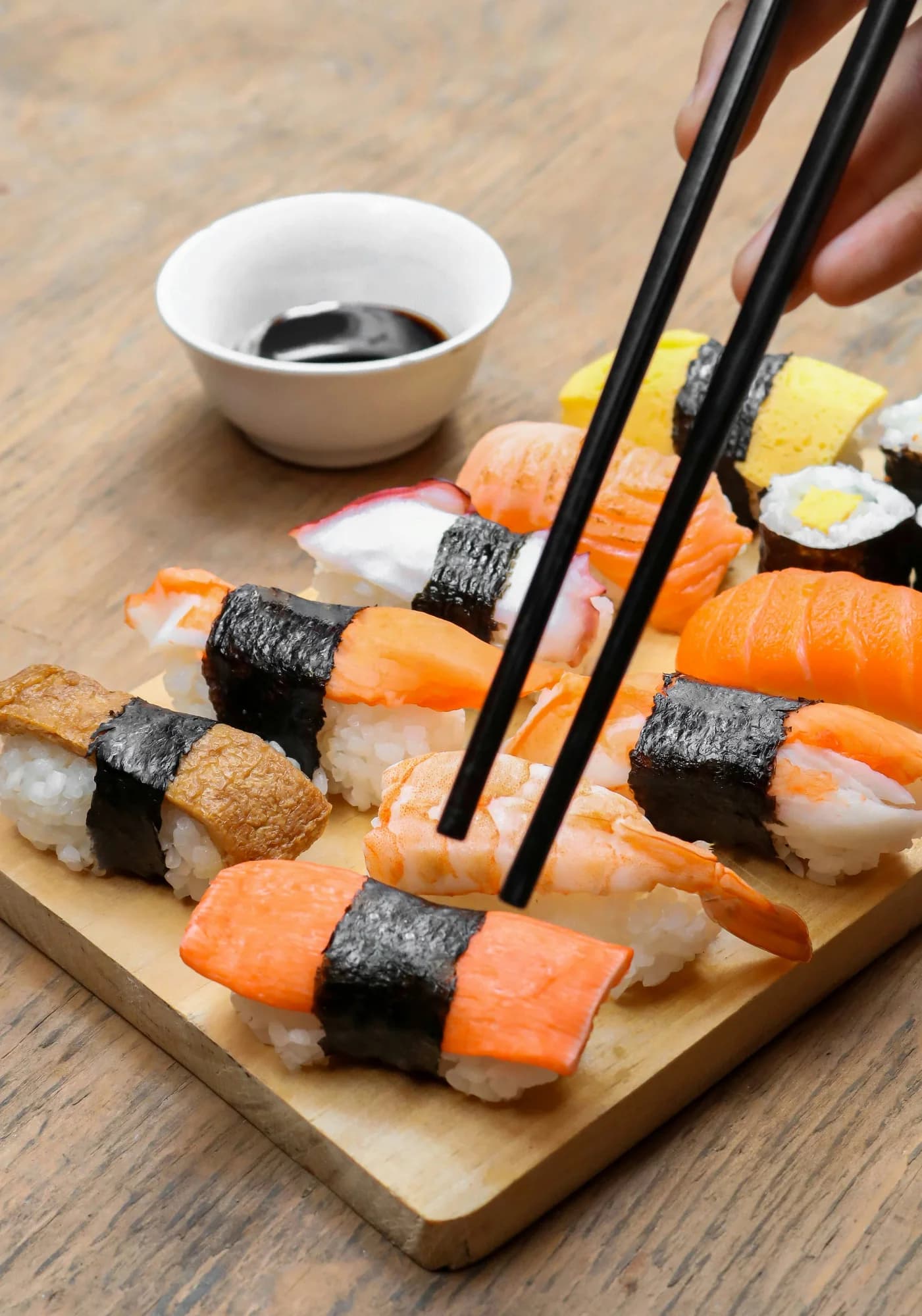 Sushi on a wooden tray — representative photo, not taken at Nippon Kitchen