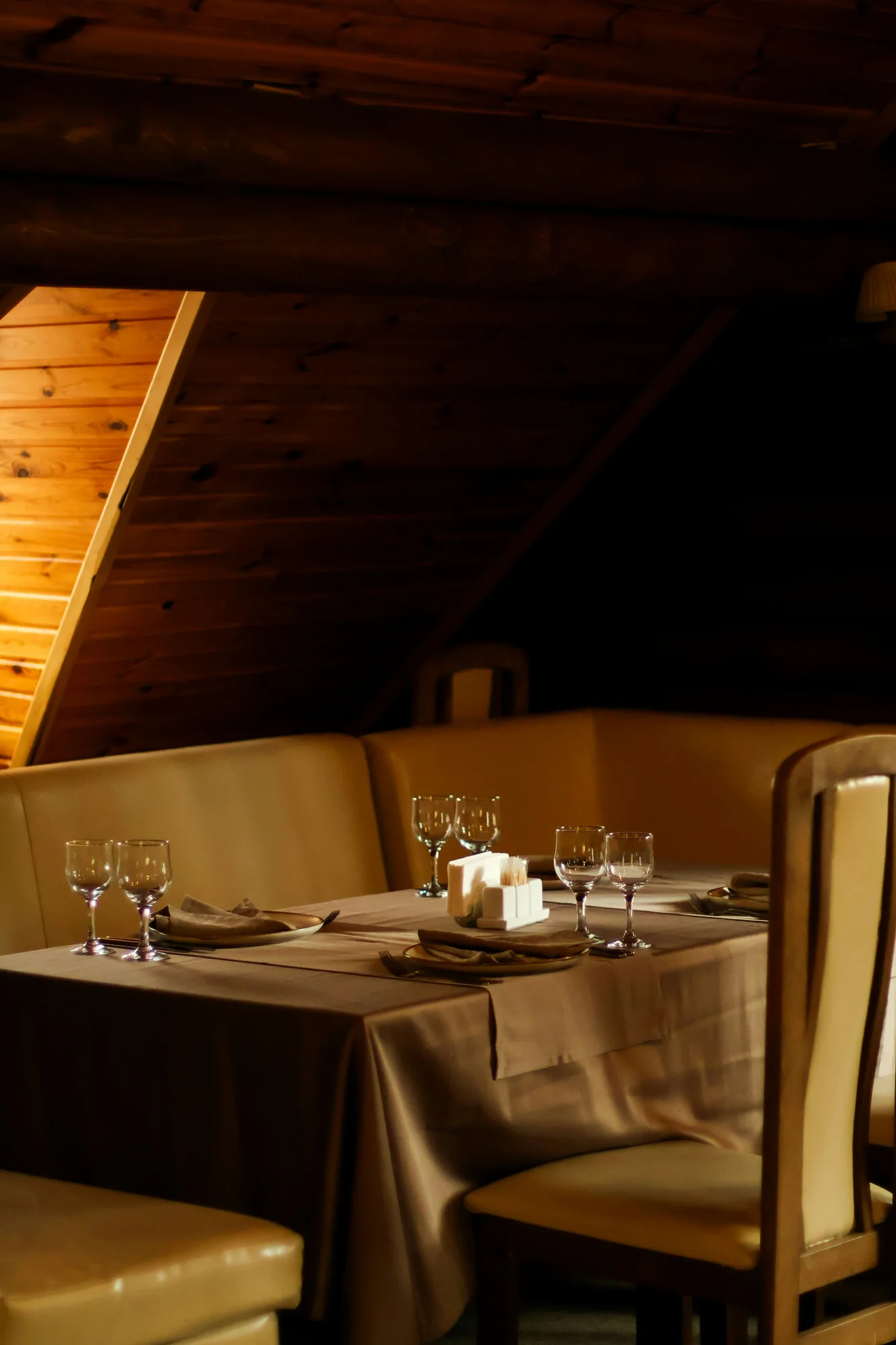 Cosy restaurant booth table setting — representative photo, not taken at Number 16