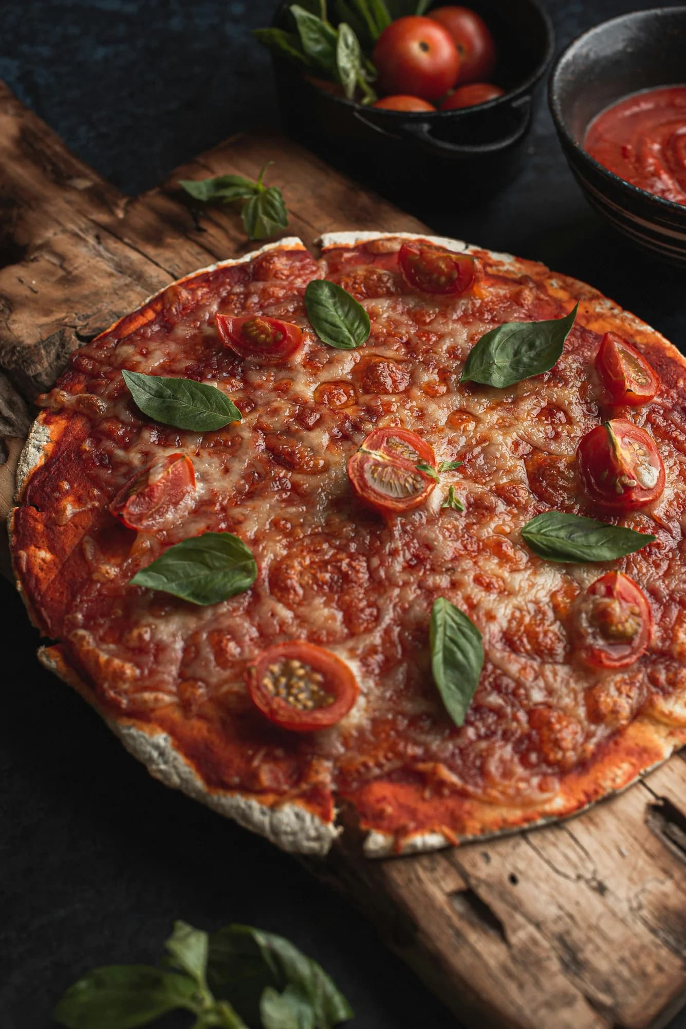 Pizza with tomato, cheese and basil — representative photo, not taken at Paesano Pizza — Great Western Road