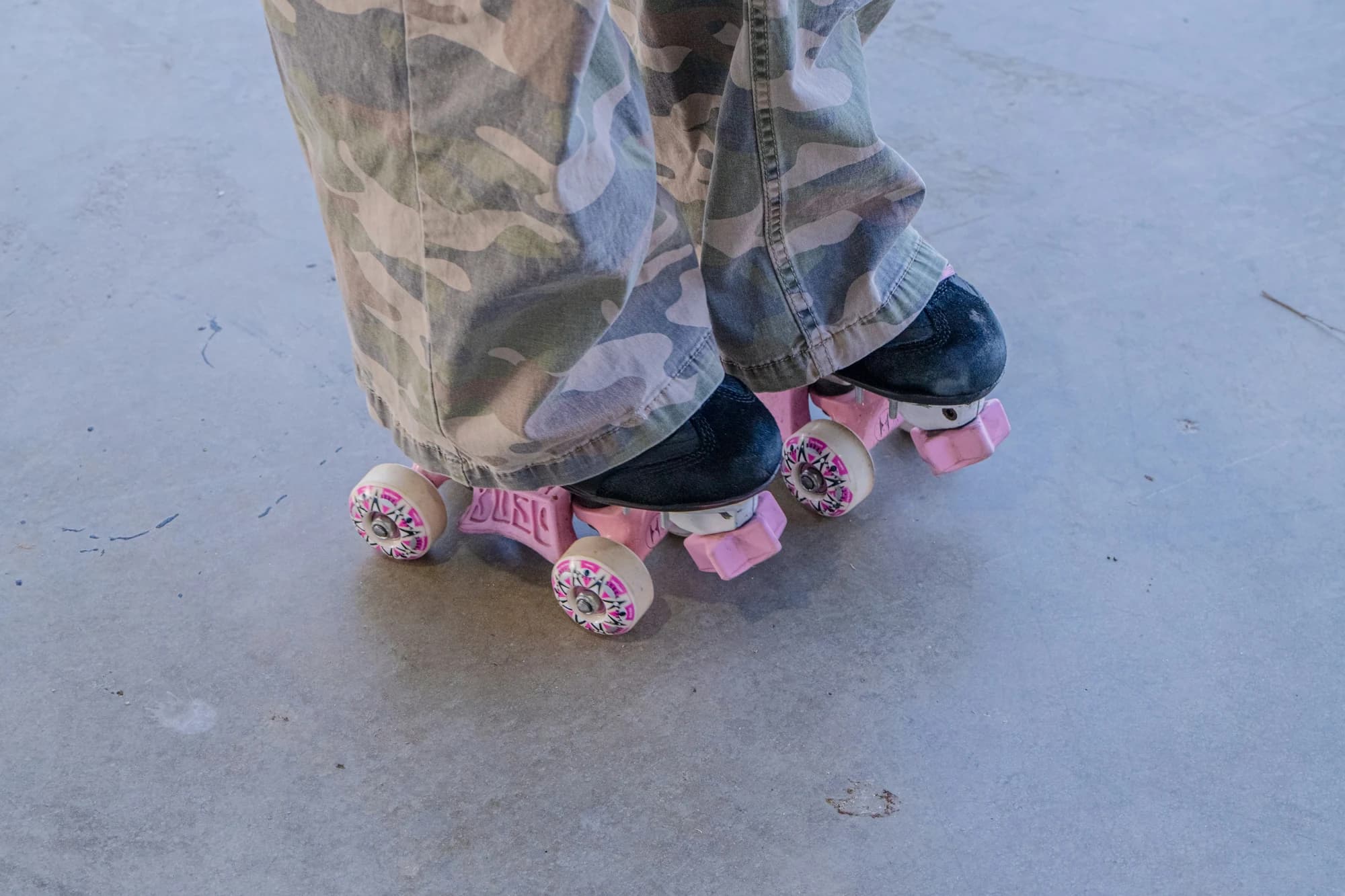 Roller skates on a person's feet. — representative photo, not taken at Rollerstop