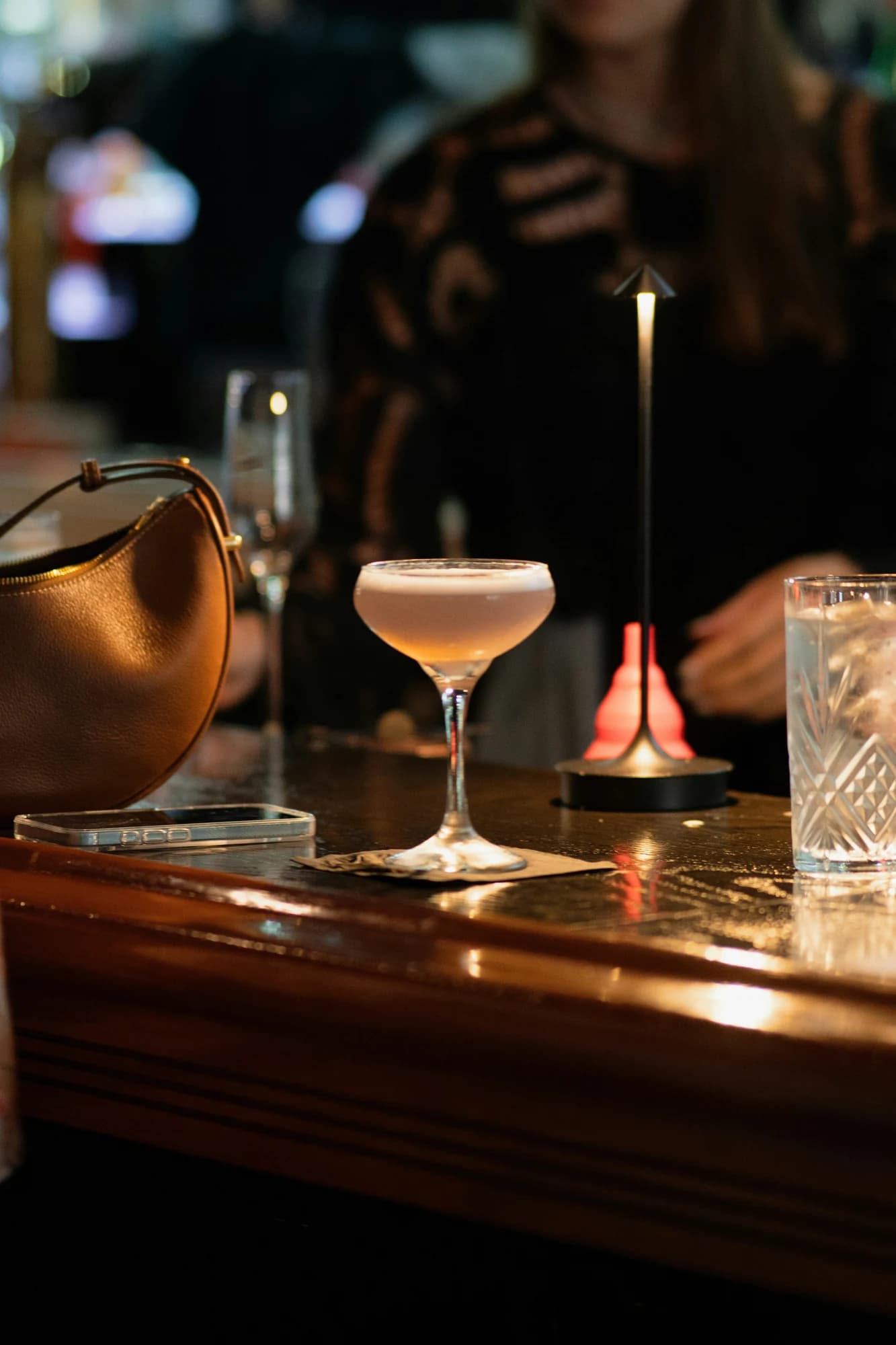 A cocktail sits on a bar, ready to be enjoyed. — representative photo, not taken at Sebb’s