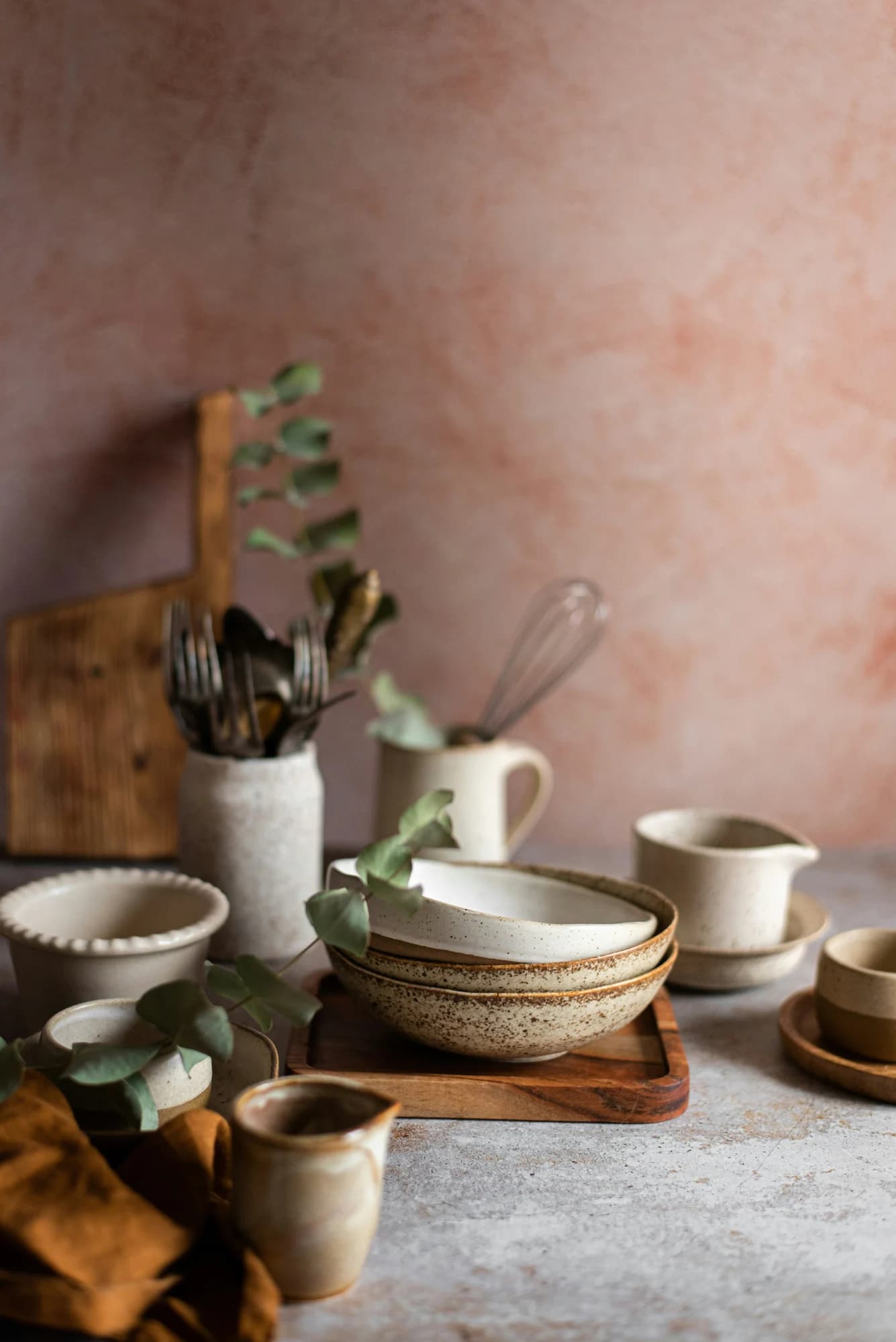 Various ceramic bowls and kitchen utensils arranged decoratively. — representative photo, not taken at Søstrene Grene — St. Enoch