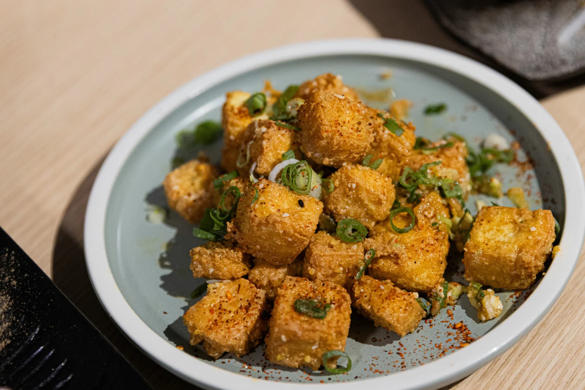 Fried tofu with green onions — representative photo, not taken at Suissi Vegan Kitchen