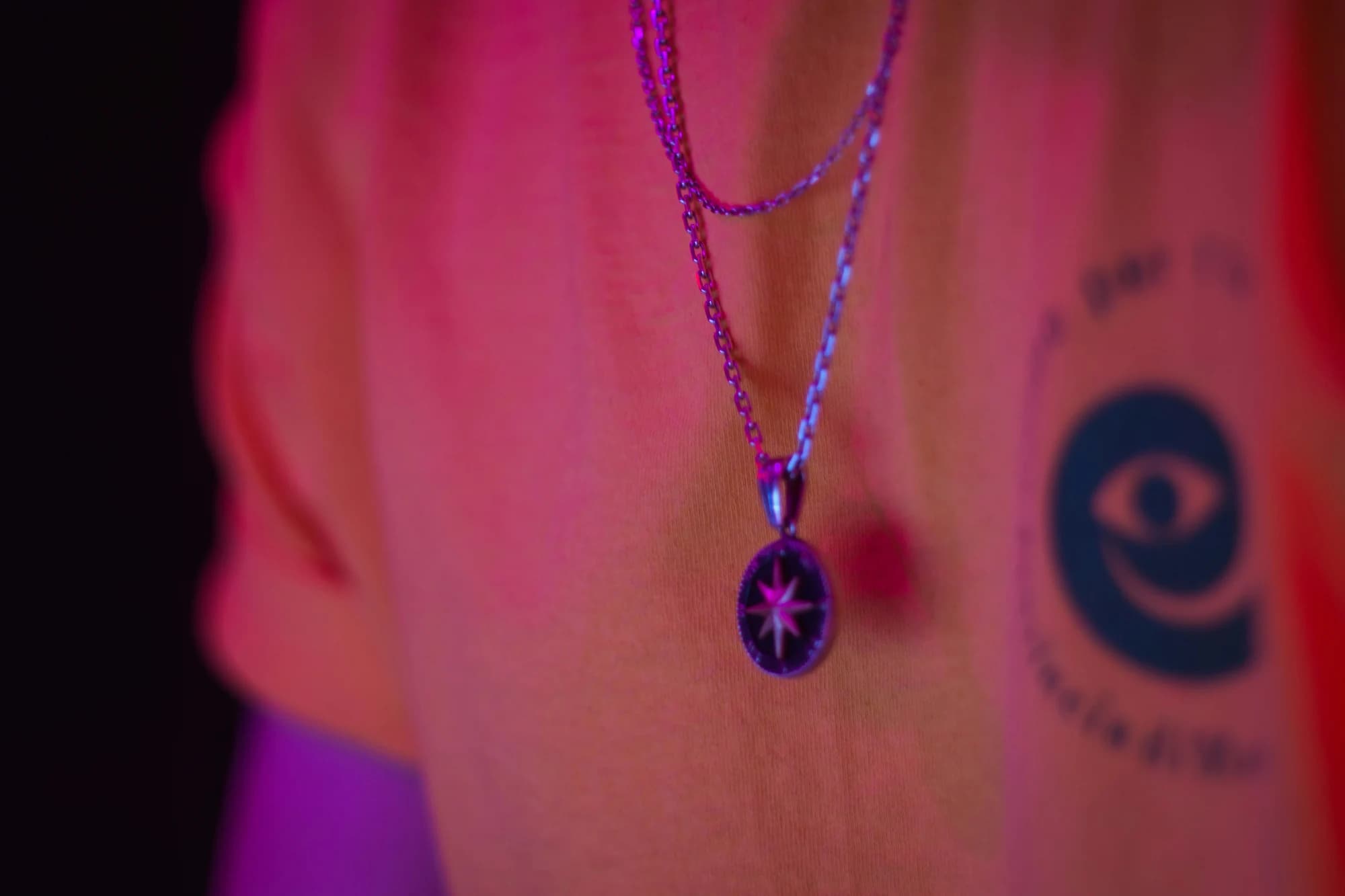 Close up of a star pendant on a necklace. — representative photo, not taken at Swarovski — St. Enoch