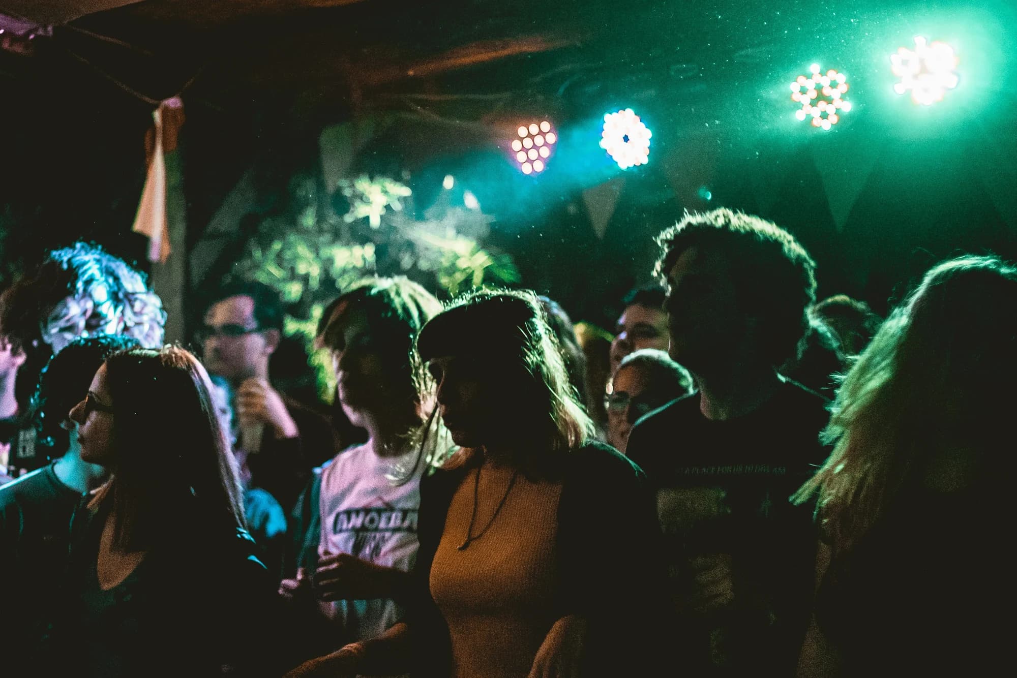 People inside the club with disco lights — representative photo, not taken at The Buff Club
