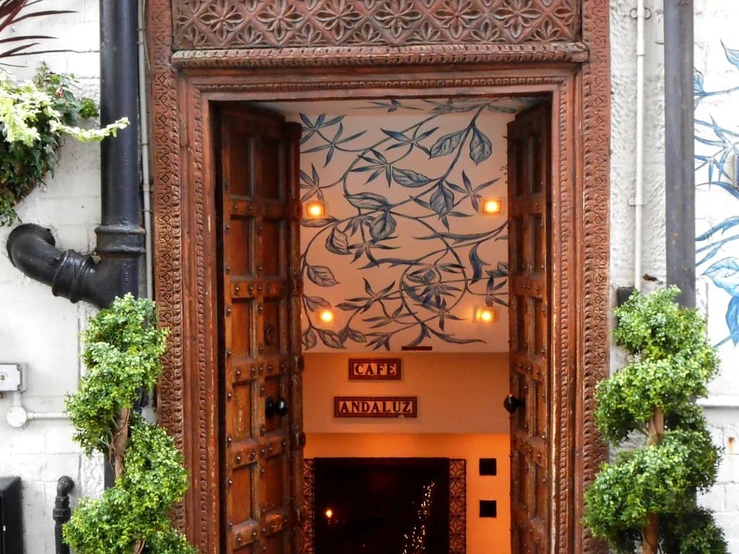 Ornate entrance to Café Andaluz on Cresswell Lane, West End