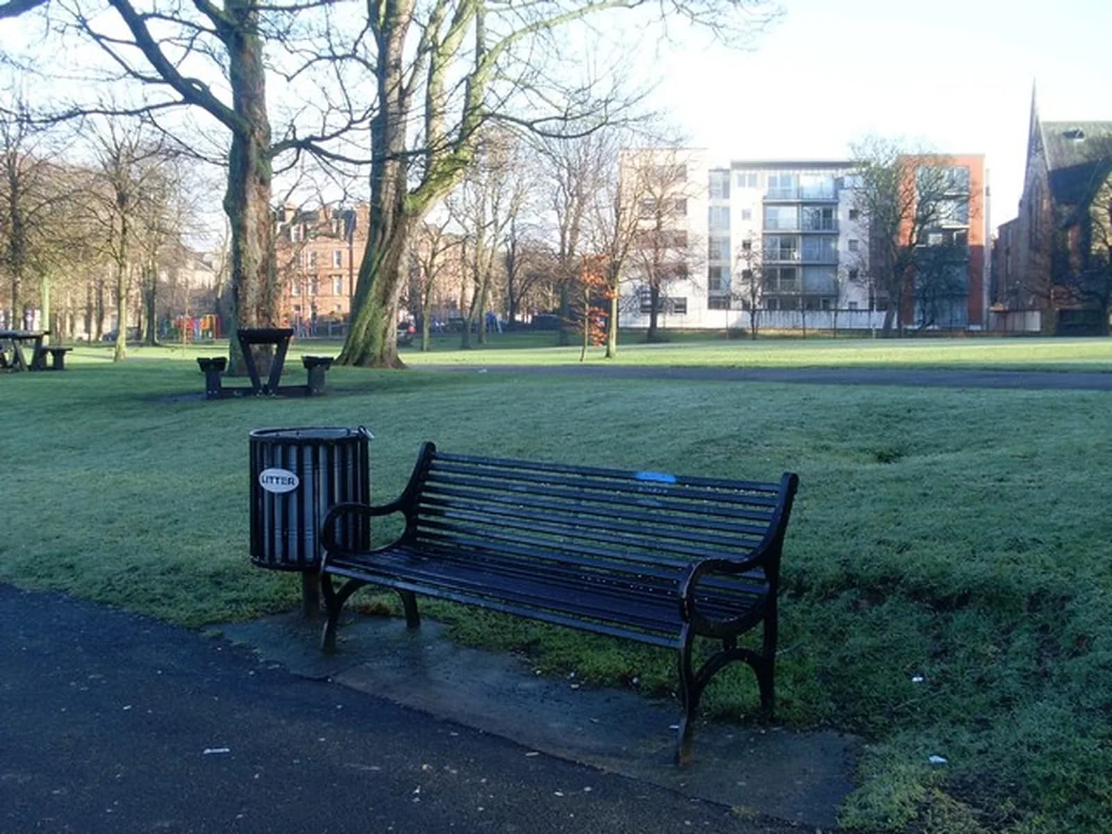 Park bench by the duck pond in Queen's Park, Glasgow