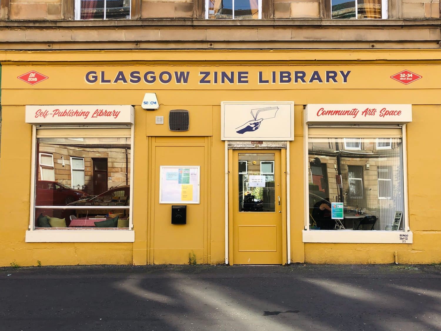 Yellow Glasgow Zine Library frontage at 32–34 Albert Road