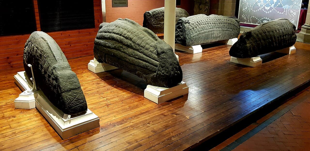 Medieval hogback stones displayed inside Govan Old Church, photographed in 2019